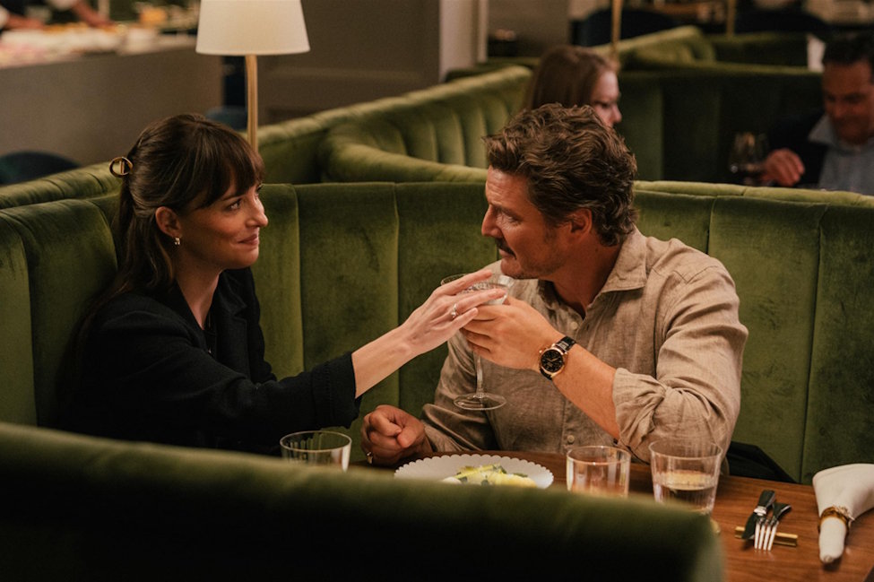 A scene from Celine Song's "Materialists", where actress Dakota Johnson is having dinner with a good-looking man.