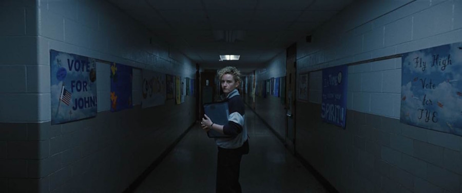 The liminal space of a blue hallway in Zach Cregger's 2025 film "Weapons", as reviewed by poet and critic Ezekiel Yu.